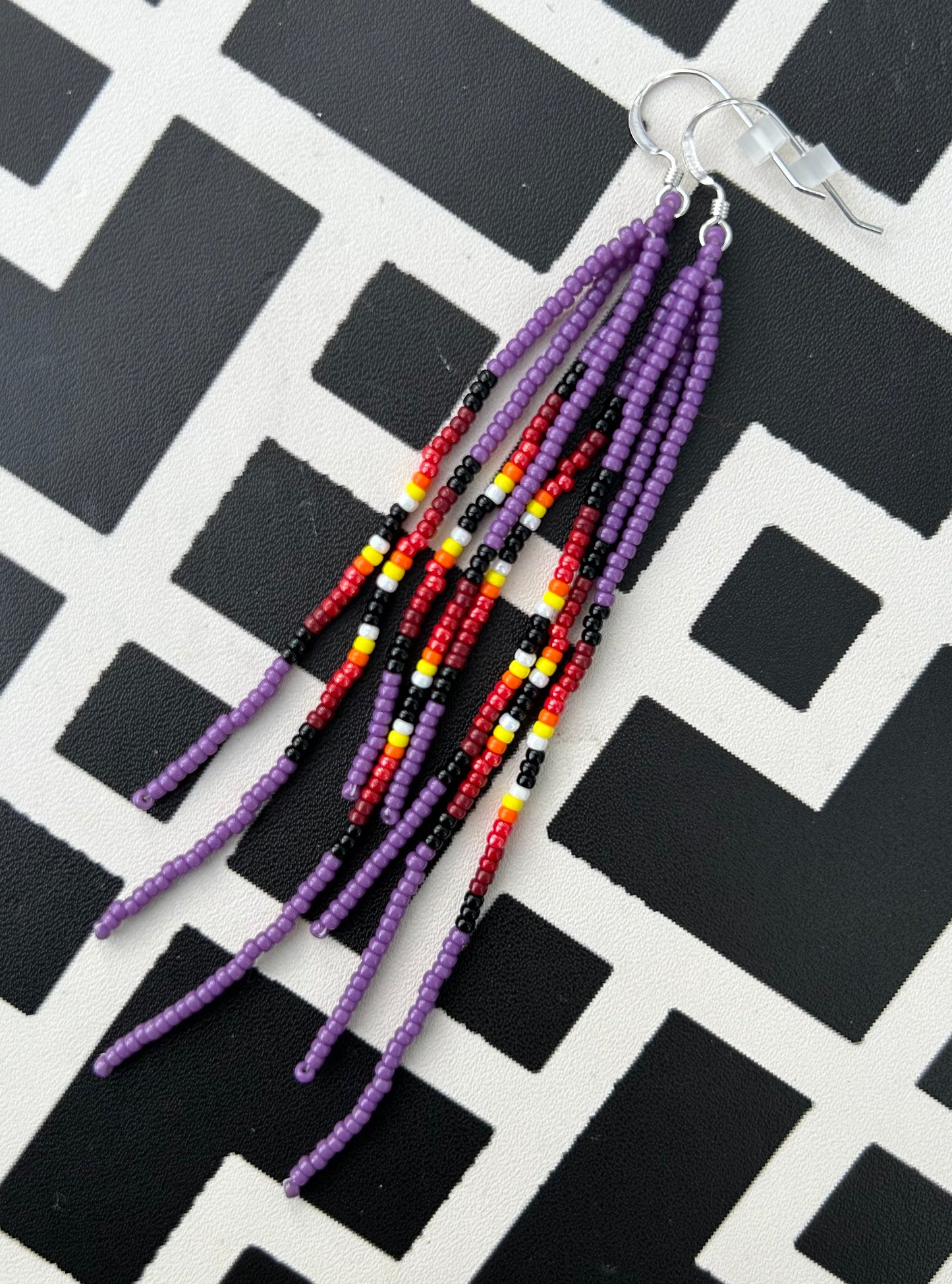 ᐄᔨᔥᑯᑖᐤ iiyishkutaau/fire earrings