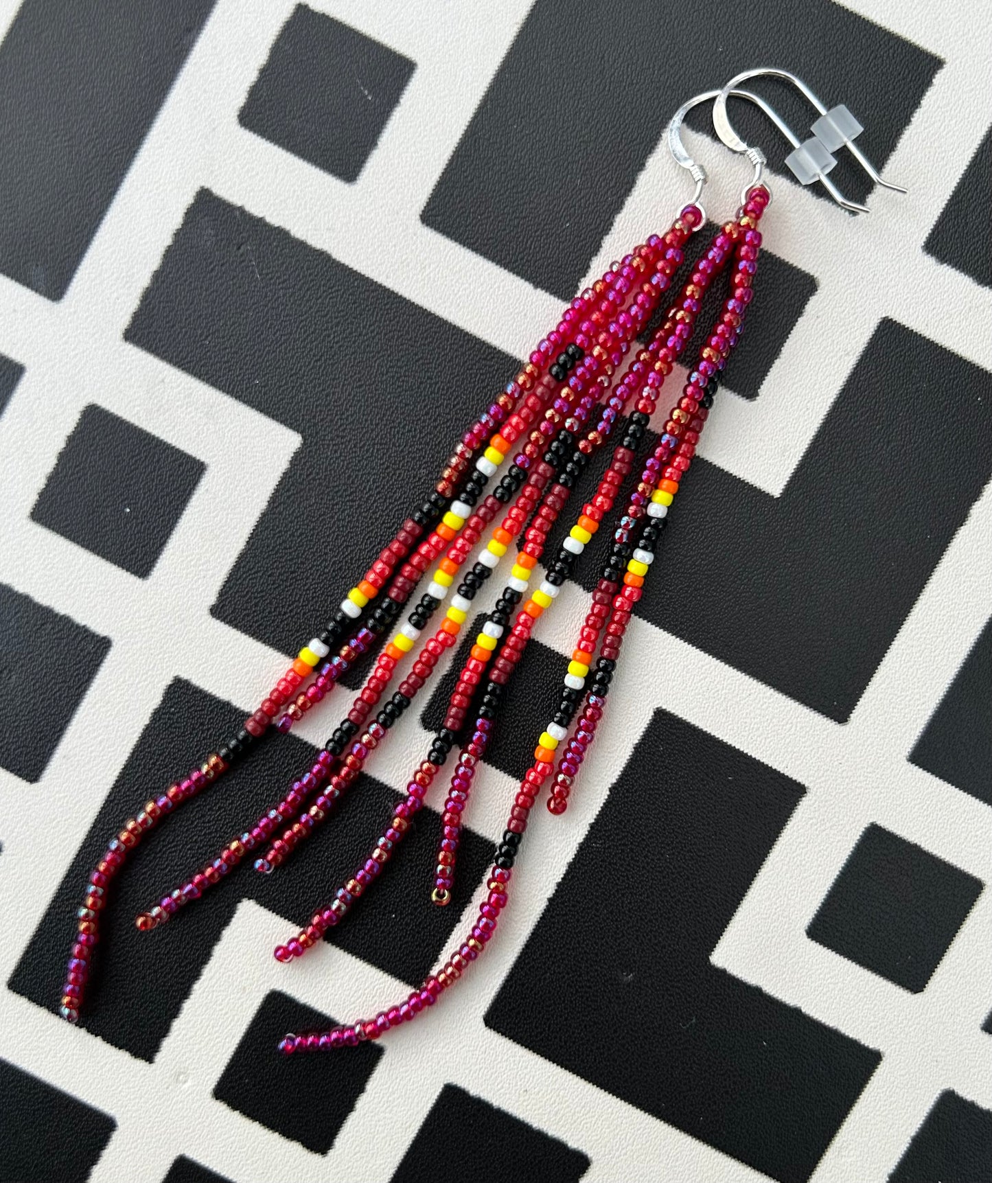ᐄᔨᔥᑯᑖᐤ iiyishkutaau/fire earrings
