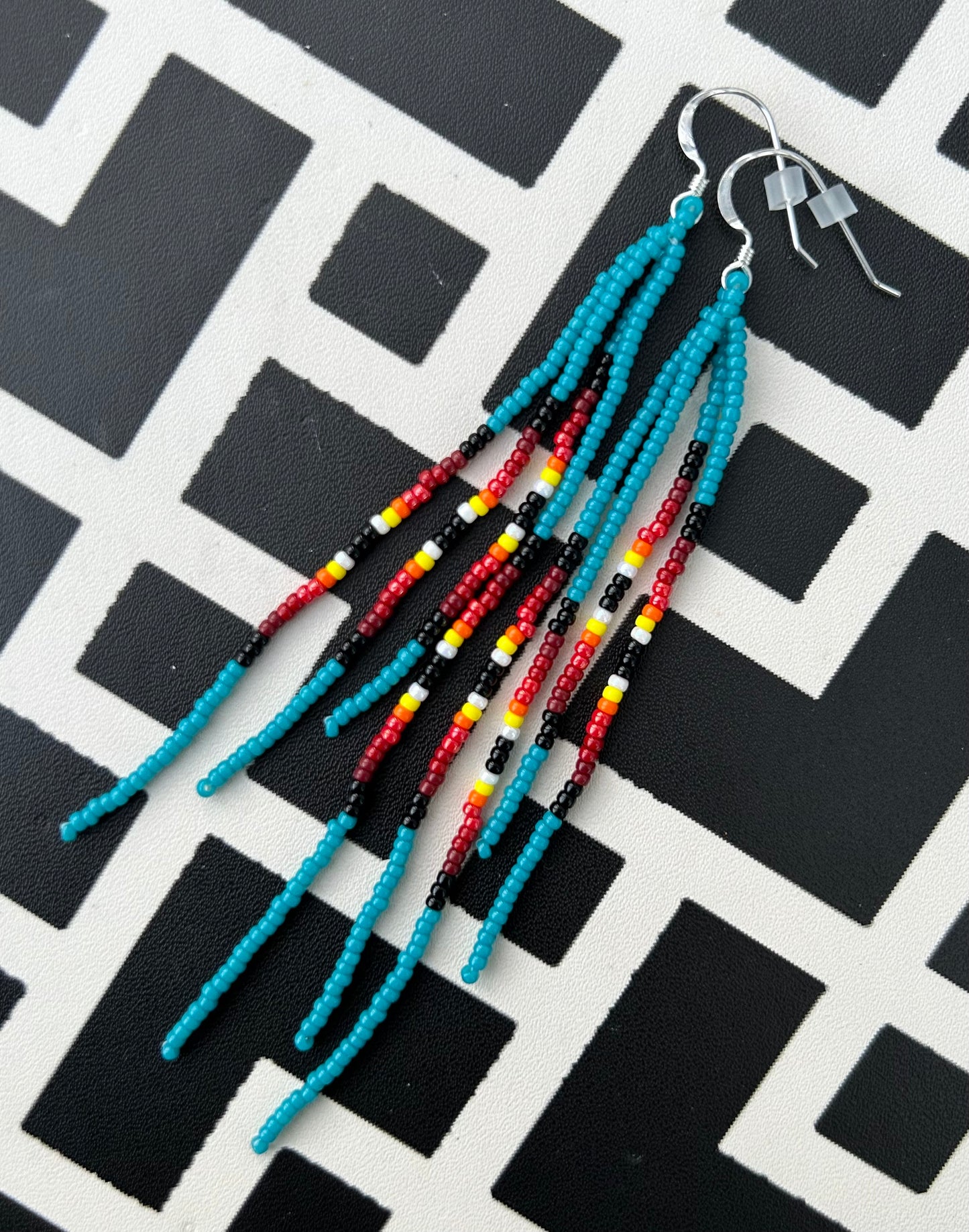 ᐄᔨᔥᑯᑖᐤ iiyishkutaau/fire earrings