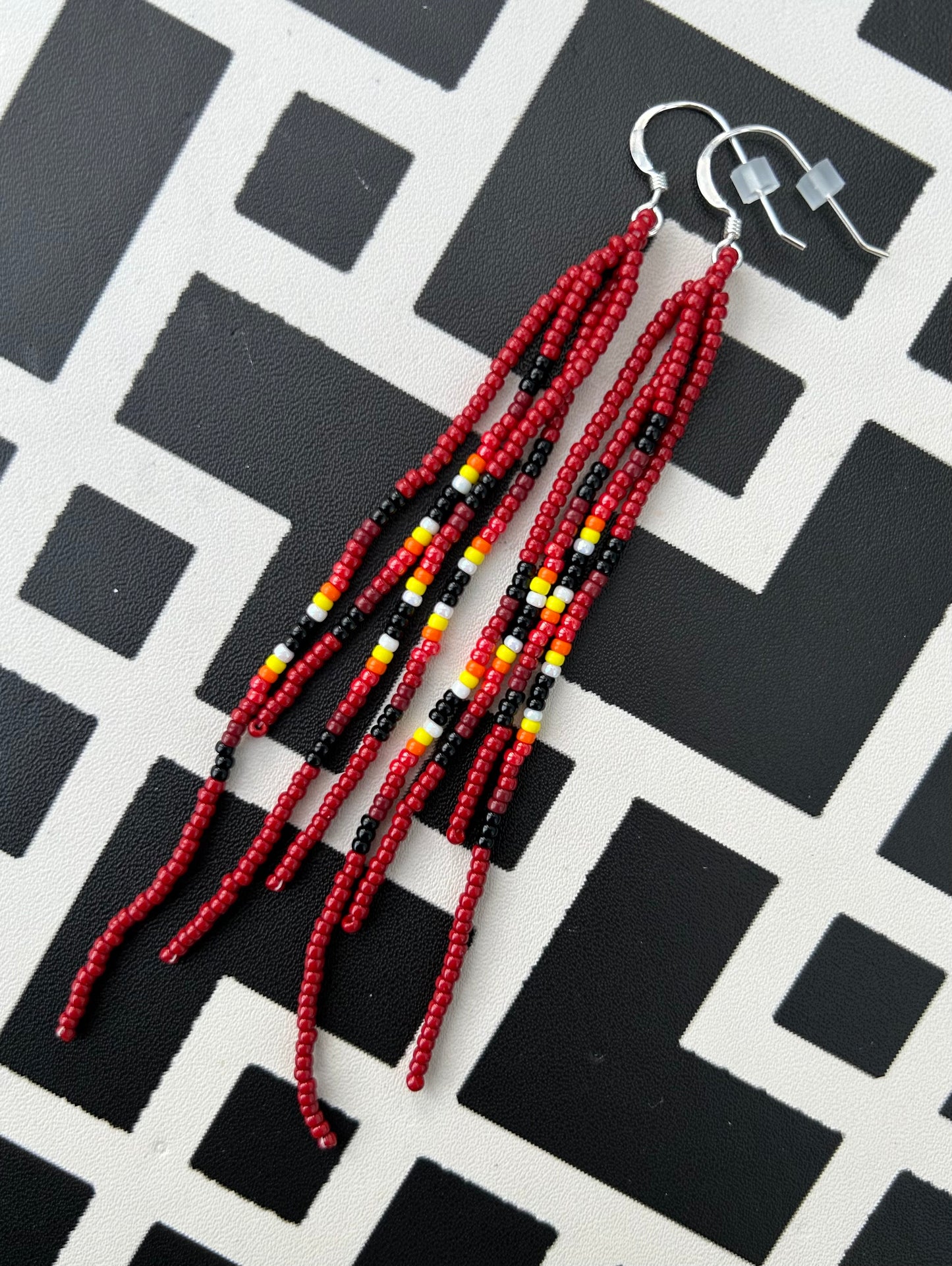 ᐄᔨᔥᑯᑖᐤ iiyishkutaau/fire earrings
